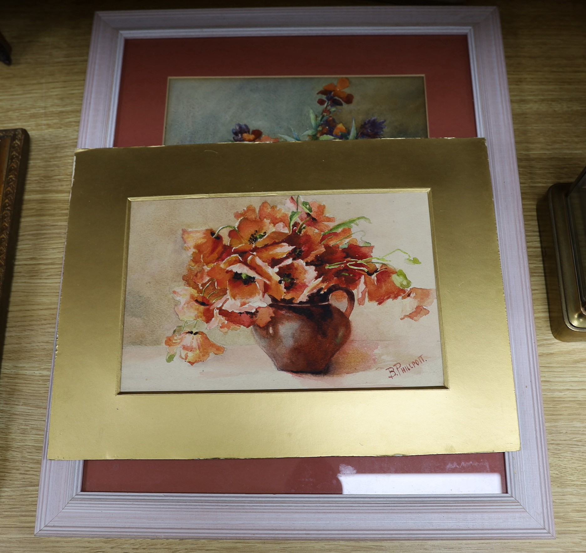 Bramwell Smith, watercolour, Still life of wall flowers in a glass vase, signed and dated 1911, 34 x 25cm and an unframed still life by B. Phillpott, 17 x 26cm